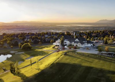 Clubhouse and range at sunset